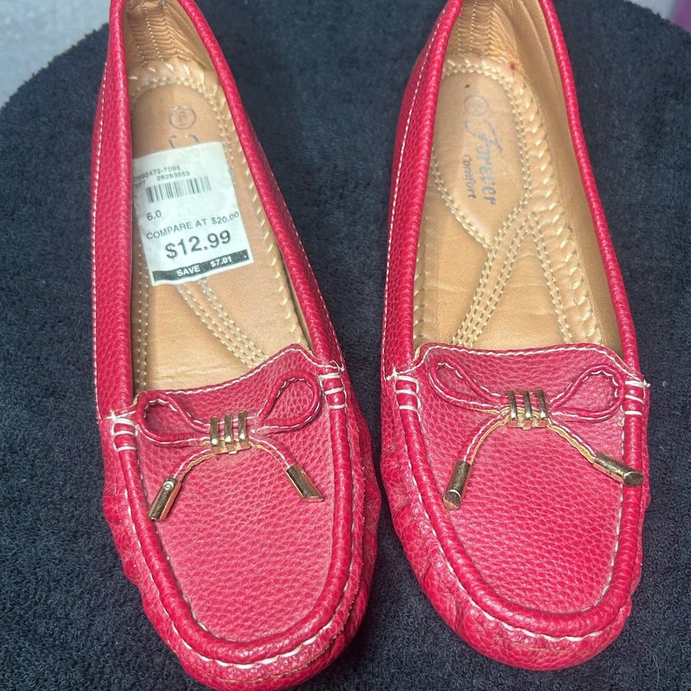 Red flats. Never worn.